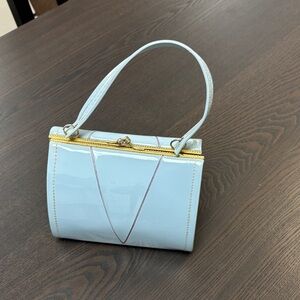 Elegant Vintage Blue Handbag with Gold Accents